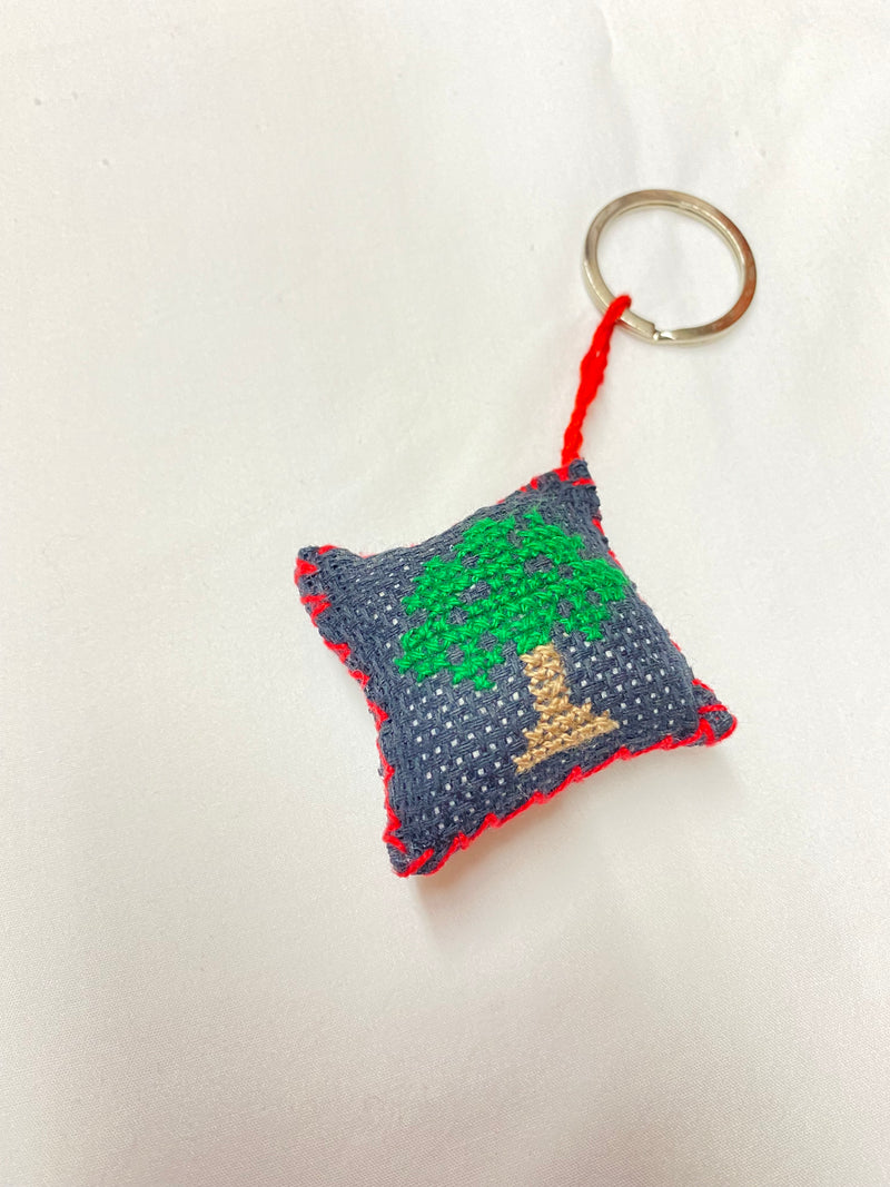 Palestinian embroidered pouch key chain with beige tree stump